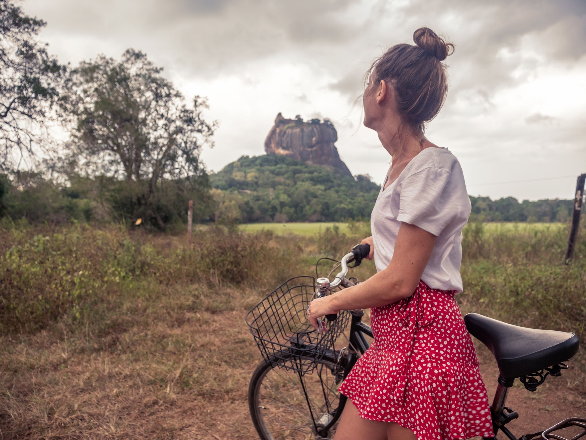 Tourist exploring sightseeing in Sri Lanka with bicycle